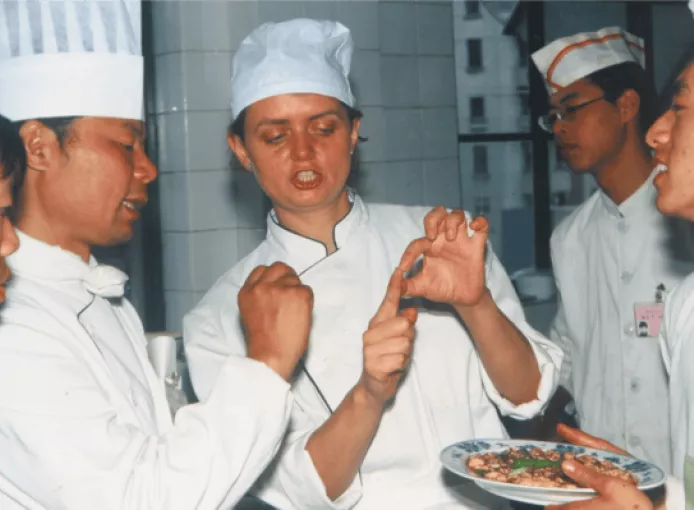 Ms Fuchia Dunlop - vintage shot of Fuchsia at cooking school in China 1- Image Credit Lai Wu